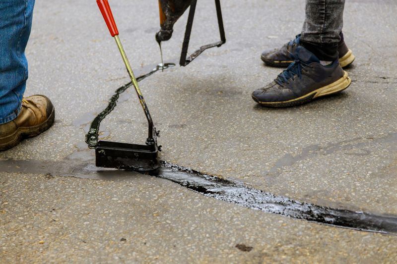 Blacktop Driveway Repair Costs — Cost of Blacktop Driveway Repair