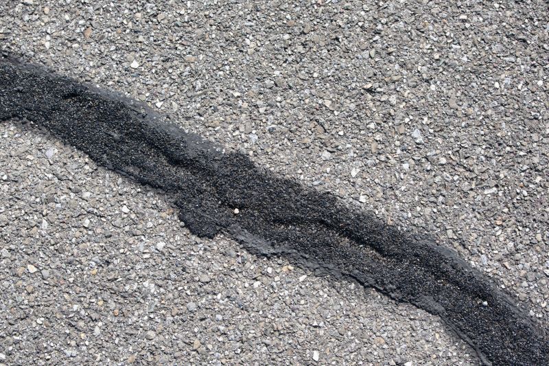 Blacktop Driveway Repair Costs — Cost of Blacktop Driveway Repair
