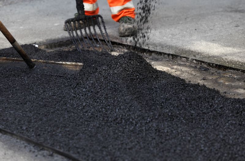 Blacktop Driveway Repair Costs — Cost of Blacktop Driveway Repair
