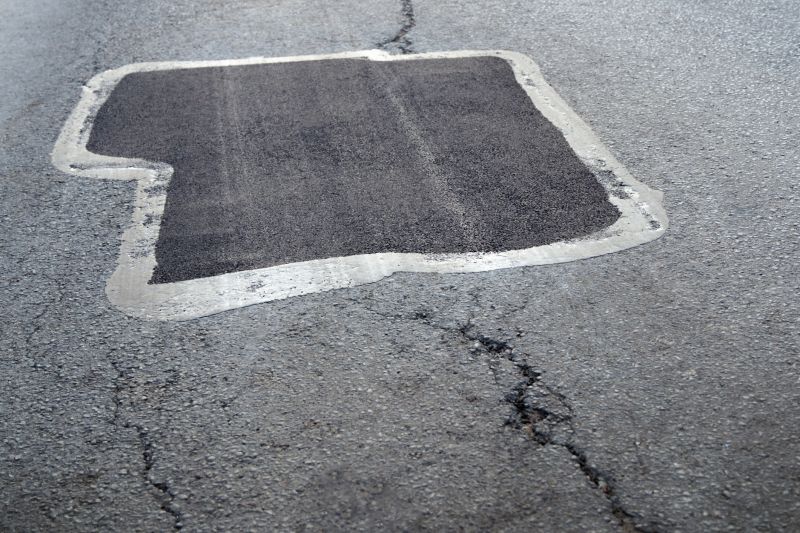 Blacktop Driveway Repair Costs — Cost of Blacktop Driveway Repair