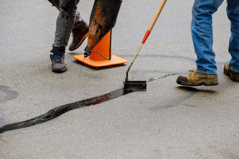 Local Blacktop Driveway Repair pros at work